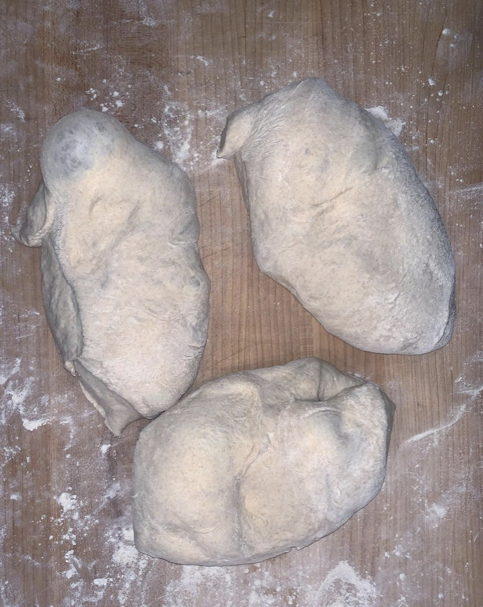 chunks of dough cut off, ready to be shaped