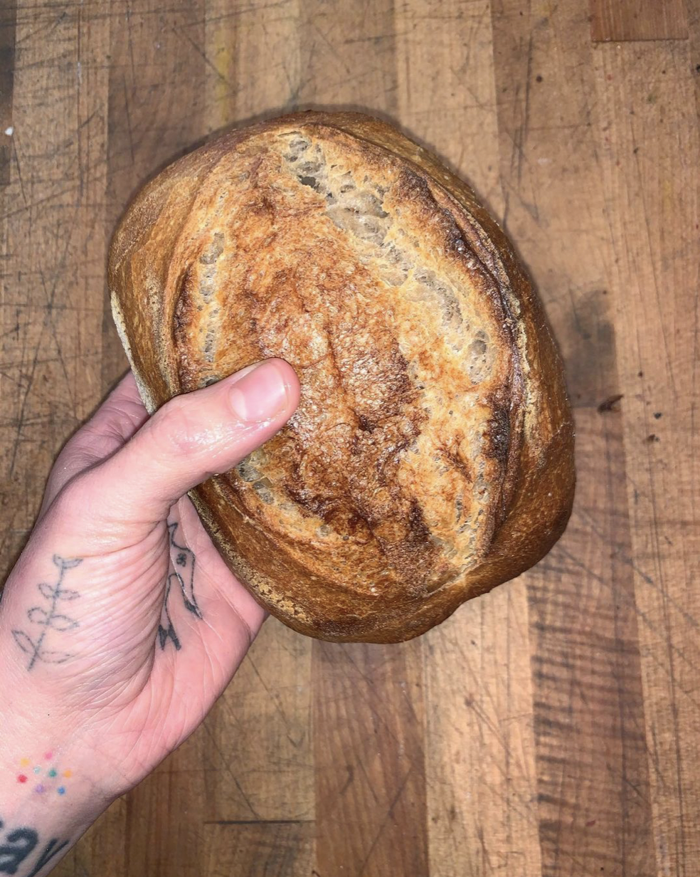 a tiny golden loaf of bread, made with leftover dough